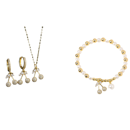 Gold jewelry set including necklace, earrings, and bracelet on a white background