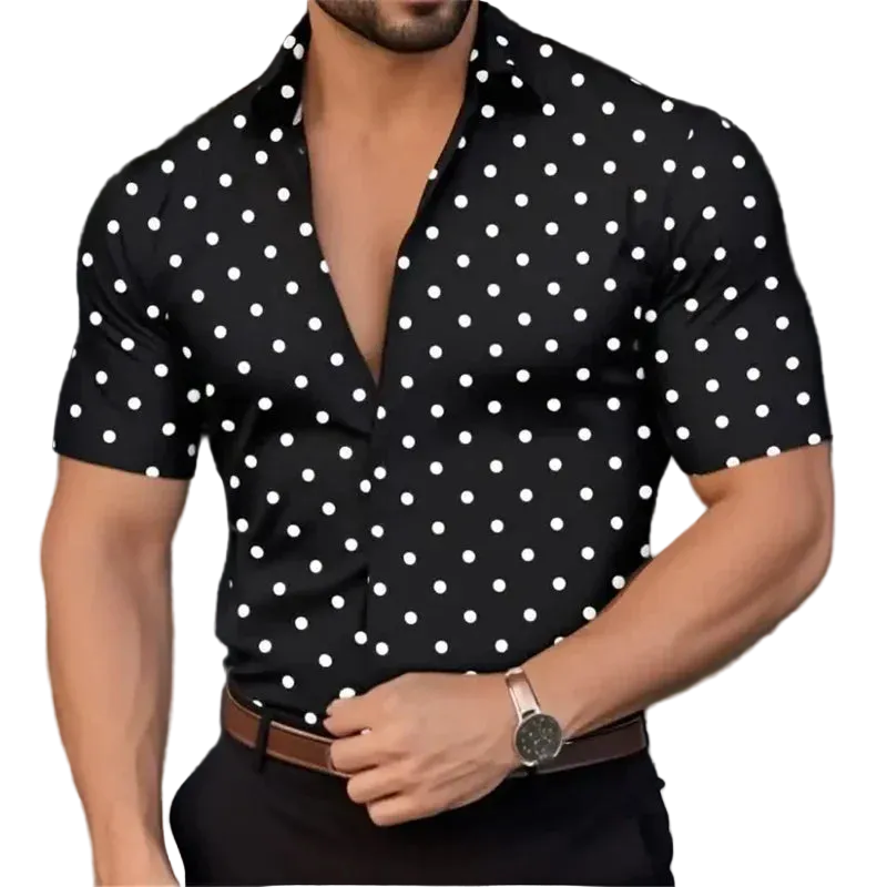 Man wearing a black short-sleeve shirt with white polka dots, blurred background