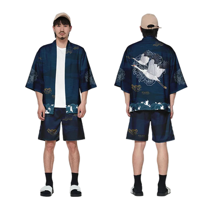 Man wearing a blue traditional outfit with white patterns, front and back views, on a white background.