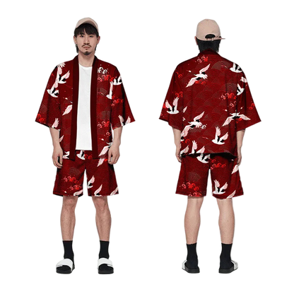 Person wearing a red kimono-style outfit with white crane patterns, shown from front and back.