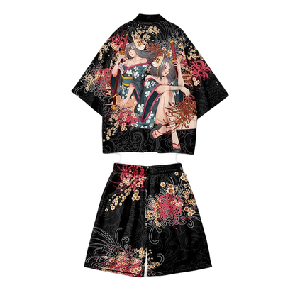Traditional black kimono with colorful floral and geometric patterns on a white background.