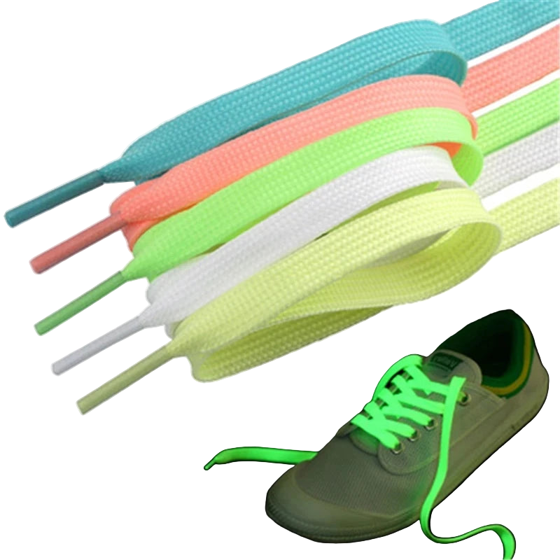 Set of colorful shoelaces with a close-up of green glowing shoelaces on a black background.