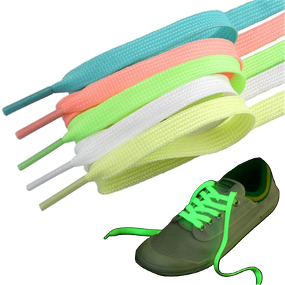 Set of colorful shoelaces with a close-up of green glowing shoelaces on a black background.