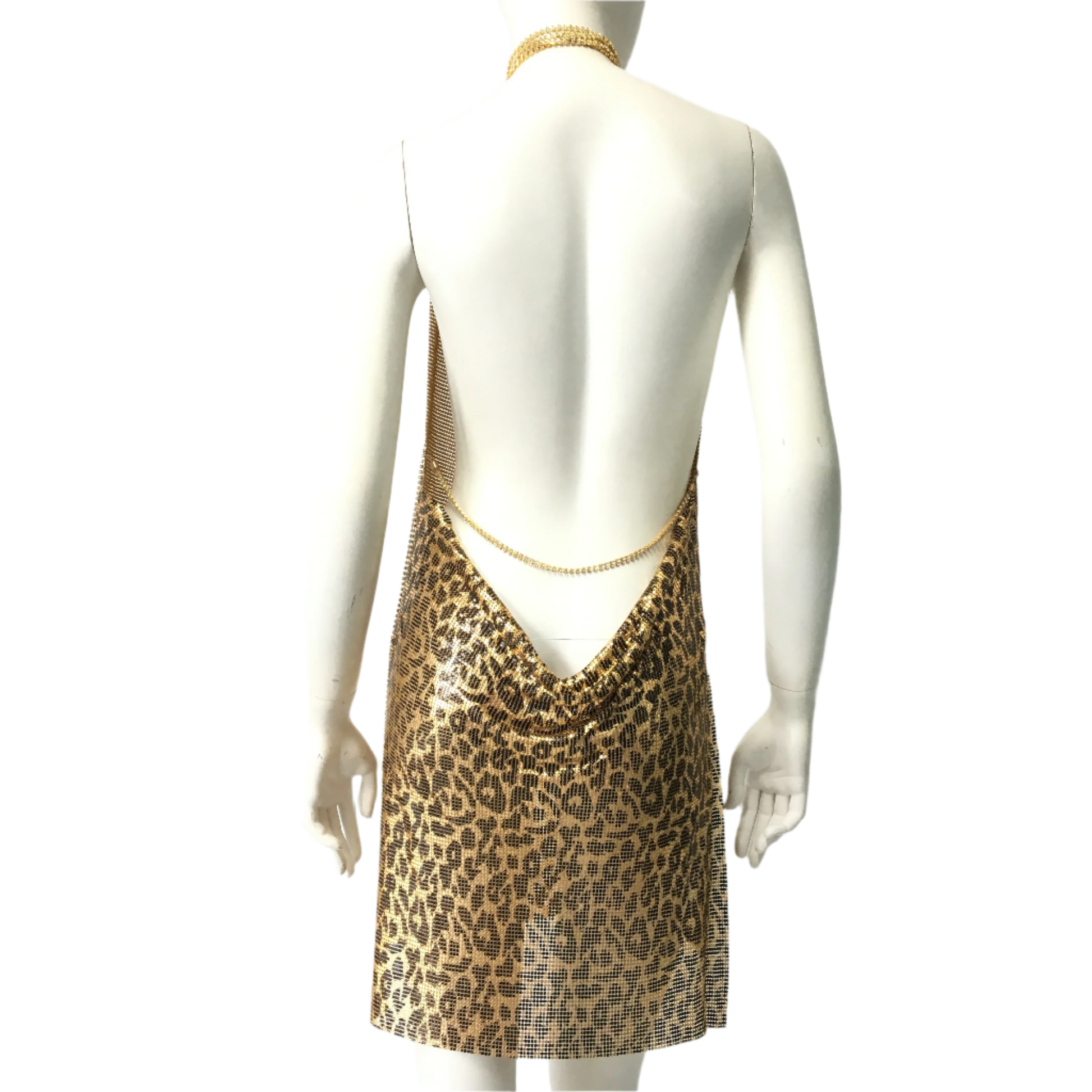 Seductive leopard print mini dress with metallic sequins featuring deep V neck and backless halter design for nightclub and party wear

