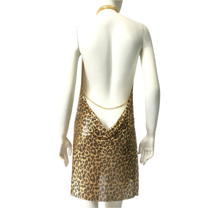 Seductive leopard print mini dress with metallic sequins featuring deep V neck and backless halter design for nightclub and party wear

