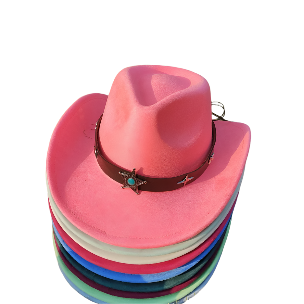 Stack of colorful cowboy hats on a grassy background
