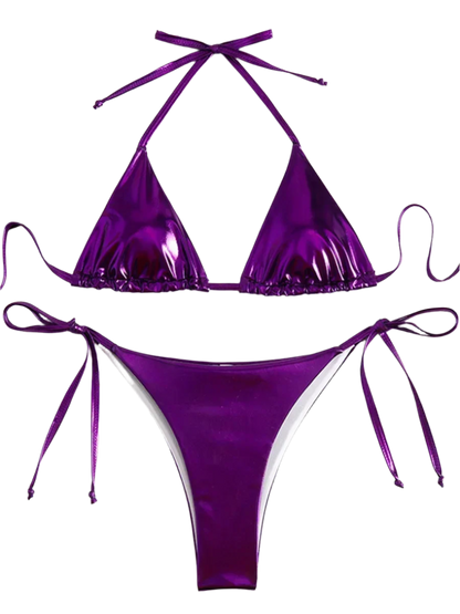 A shiny, iridescent bikini in shades of  purple. It features a classic triangle top and tie-side bottoms, creating a vibrant and eye-catching beachwear style.