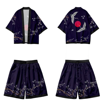 Navy blue kimono-style outfit with cherry blossom and bird designs on a white background.