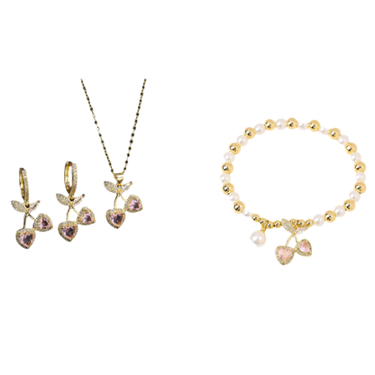 Gold jewelry set with necklace, earrings, and bracelet on a white background