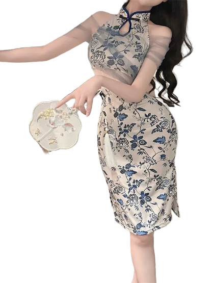 Woman wearing a floral dress in a bedroom setting