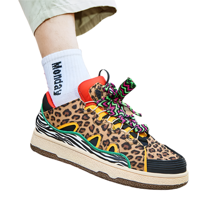 Luxury men's leopard print platform sneakers featuring vulcanized construction and elevated design for resort theme nights

