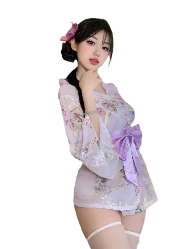 Woman wearing a light purple lace outfit with floral patterns on a white background
