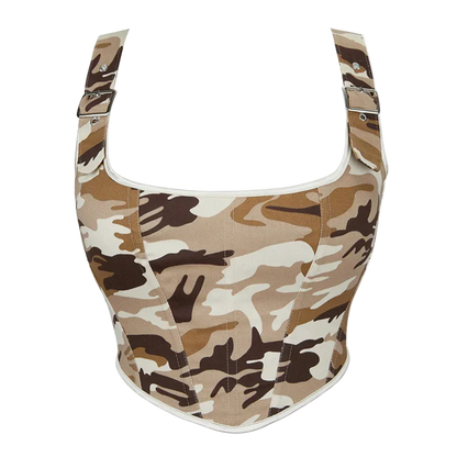A women's corset-style top with a desert camouflage pattern in beige, brown, and white, featuring adjustable shoulder straps with metal buckles, shown on a plain white background.