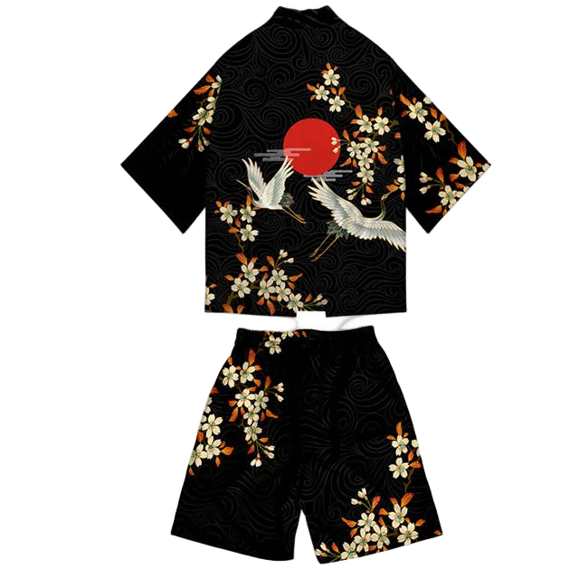 Black outfit with floral and crane design on a white background