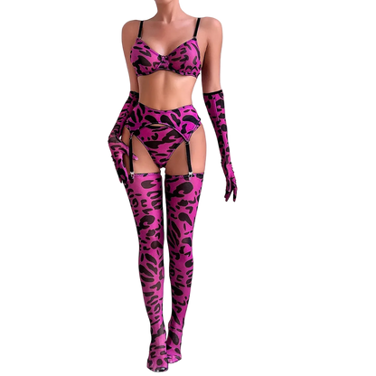 Person wearing a pink leopard print lingerie set with matching gloves and thigh-high boots on a white background.