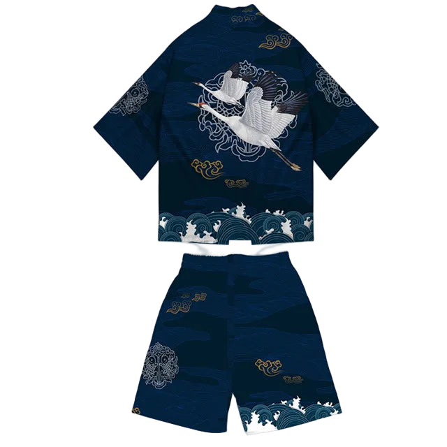 Navy blue children's outfit with crane design on a white background