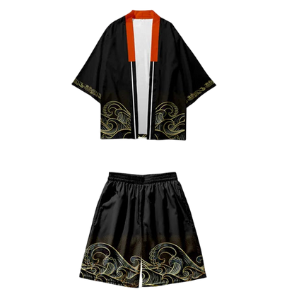 Traditional black kimono with gold embroidery on a white background