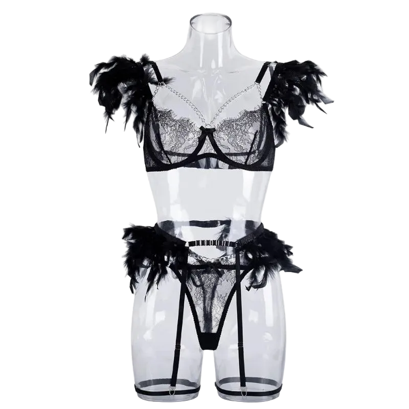 Black lace lingerie set with feathered shoulder and hip details, displayed on a transparent mannequin against a white background.