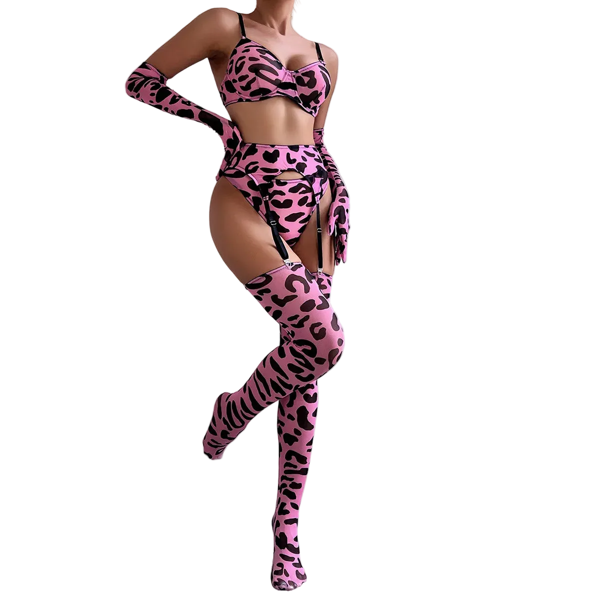 Person wearing a pink leopard print outfit with long gloves and stockings against a white wall.