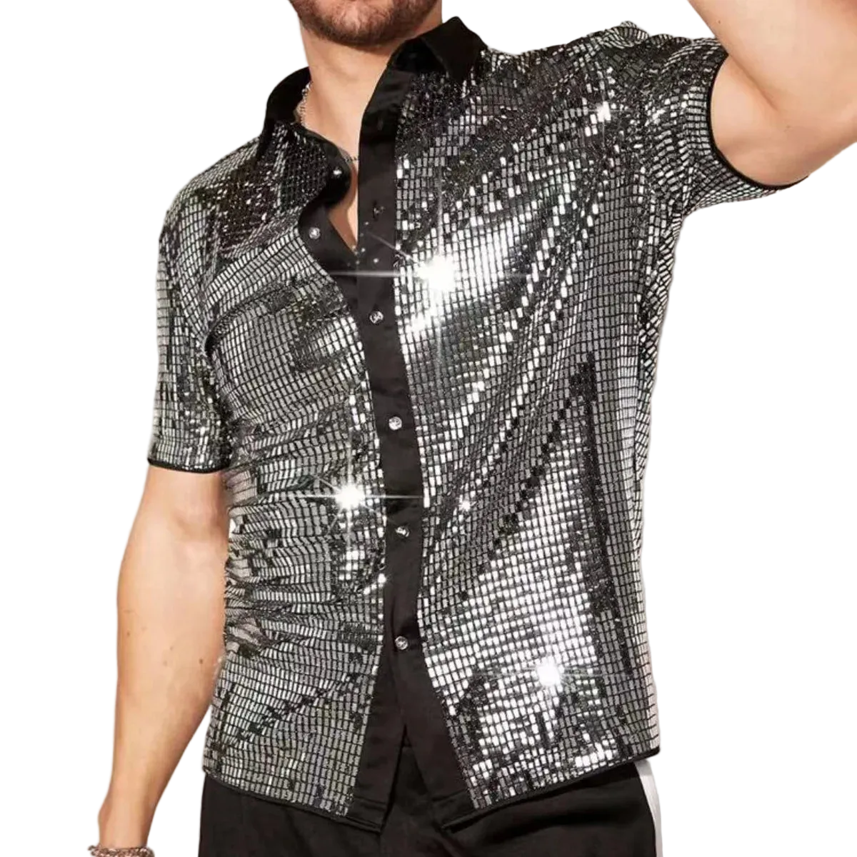 Person wearing a sparkling silver shirt against a neutral background