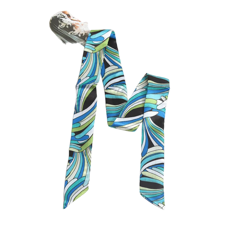 Colorful patterned scarf on a white surface