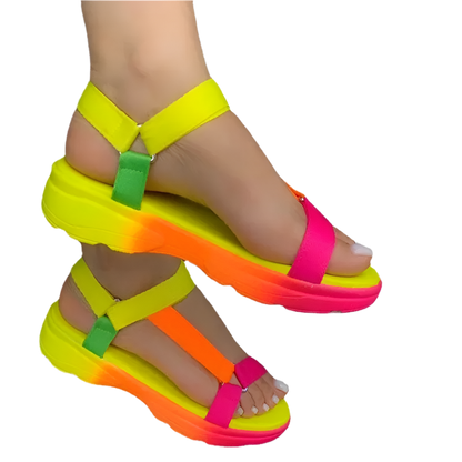 Neon colorful sandals on a white background