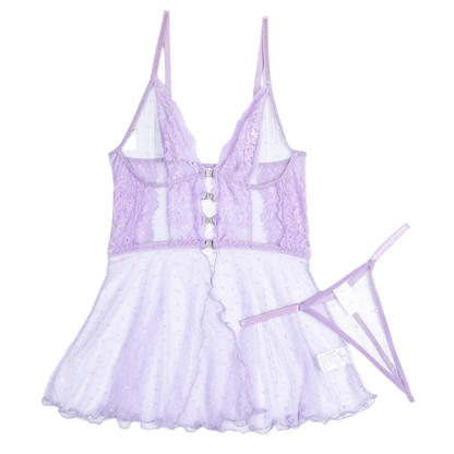 Lavender lace babydoll dress with white petticoat on a white background