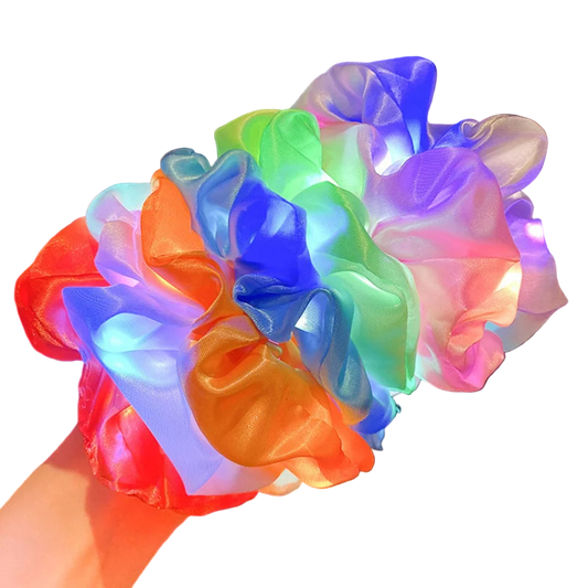 Colorful LED scrunchies on a blurred indoor background