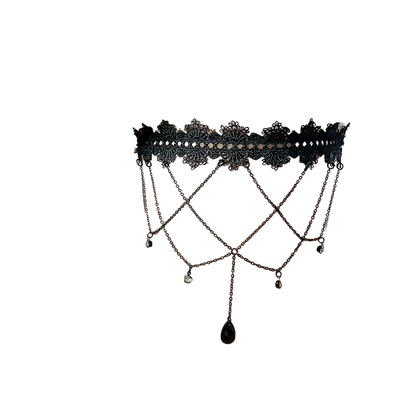 Black lace anklet on a person's ankle with a white background
