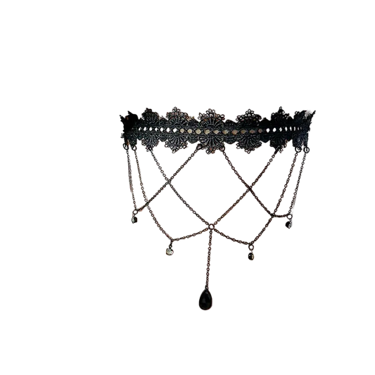 Black lace anklet on a person's ankle with a white background