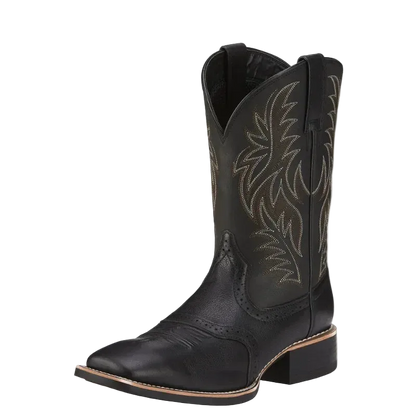 Black cowboy boot with intricate stitching on a white background