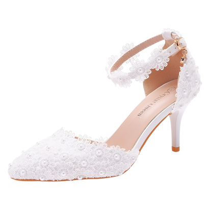 White lace high-heeled shoe on a white background