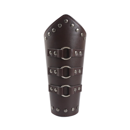Brown leather bracer with metal buckles and studs on a white background