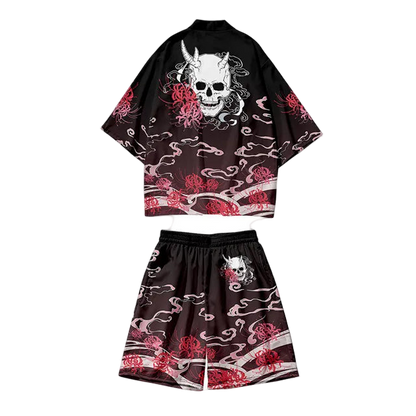 Black kimono-style outfit with red floral and white skull designs on a white background.