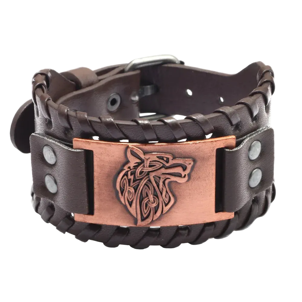 Brown leather bracelet with a copper metal clasp featuring a wolf design on a white background