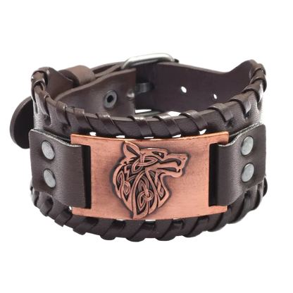 Brown leather bracelet with a copper metal clasp featuring a wolf design on a white background