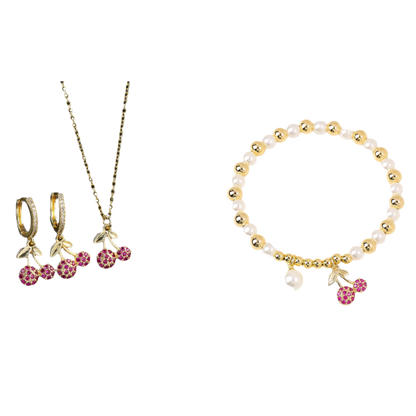 Jewelry set with cherry-themed earrings and necklace on a black background, and a bracelet with cherry details on a white background.