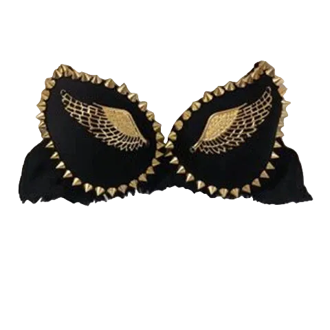 Black bralette with gold wing embroidery and gold spiked trim, displayed on a white faux fur background.