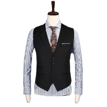 Black vest over a striped shirt on a mannequin against a blue curtain background