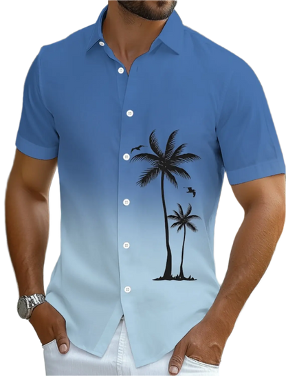 Man wearing a blue shirt with palm tree design