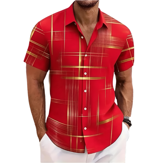 Red and gold checkered shirt worn by a person on a plain background