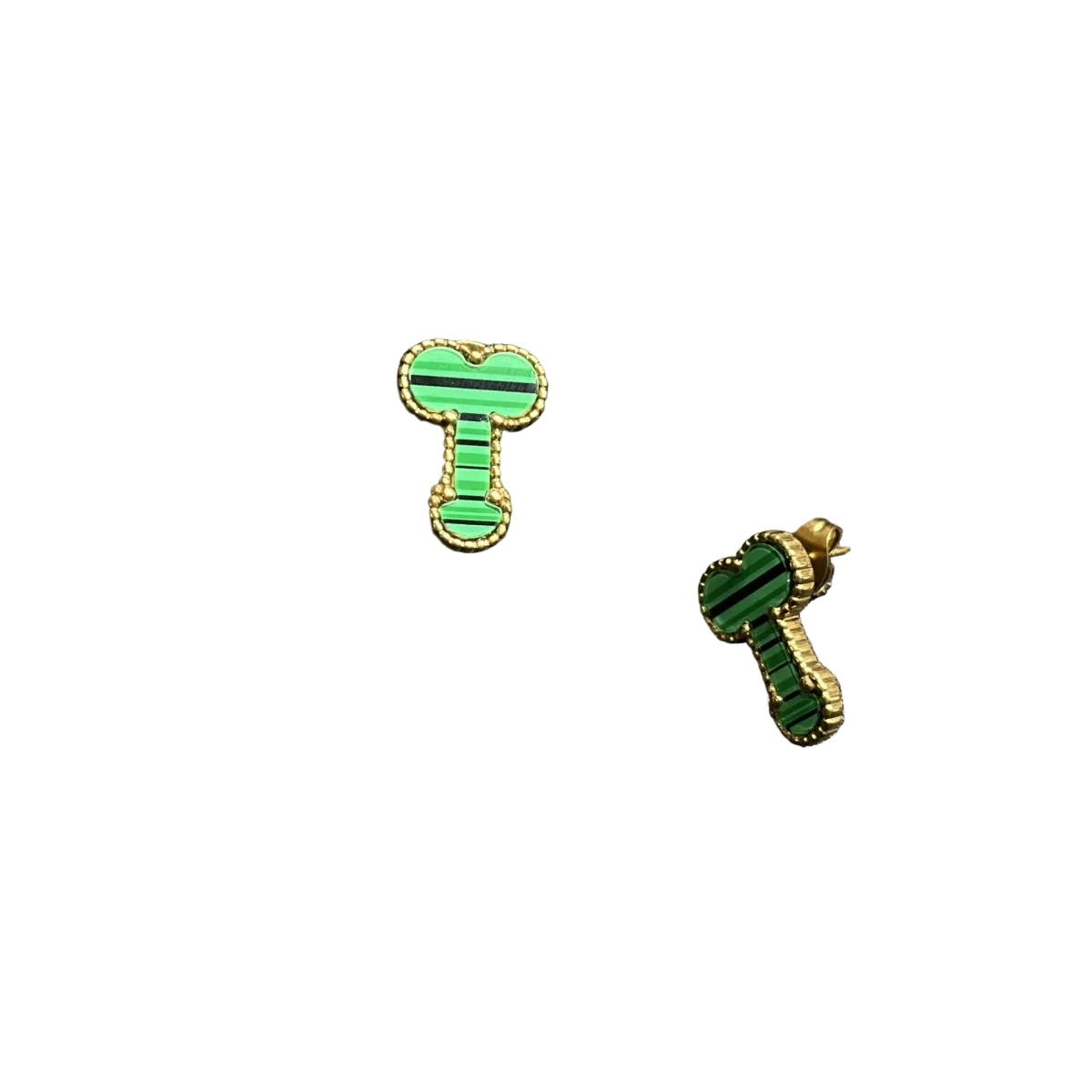A pair of green and black striped enamel earrings with gold-tone borders, displayed on a textured black surface next to a black foam block.