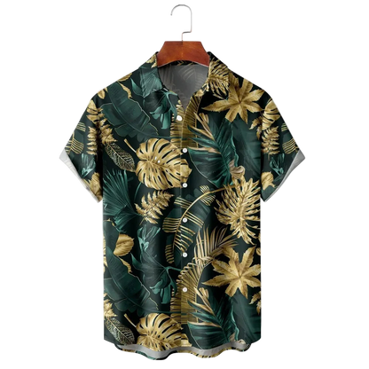 Hawaiian shirt with tropical leaf pattern on a hanger against a white background