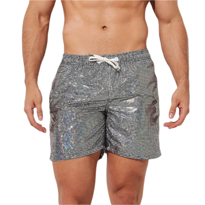 Silver holographic swim shorts with drawstring, perfect for a stylish beach day at the resort.