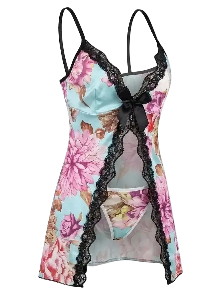 A floral print babydoll lingerie chemise with black lace trim, black spaghetti straps, and a black bow at the neckline, shown on a plain white background.