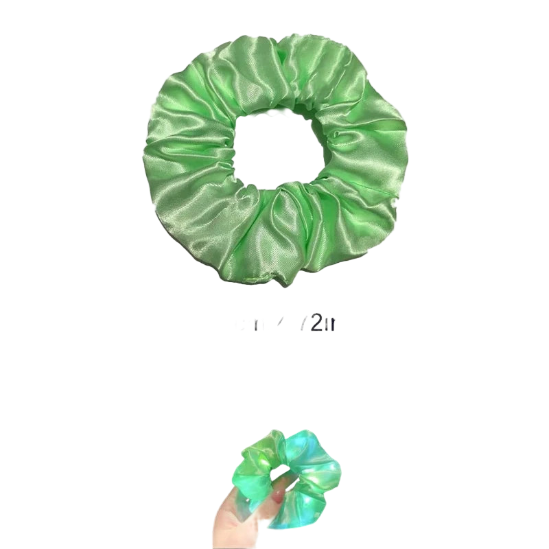 Green satin scrunchie with size measurement and additional images of it glowing in dark settings.
