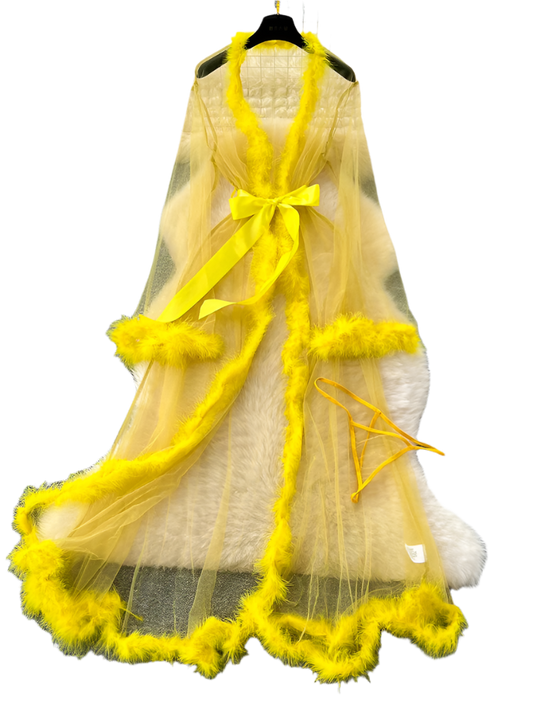 A bright yellow sheer robe with fluffy trim. It includes a matching yellow thong and is tied with a satin ribbon, creating a playful and bold look.