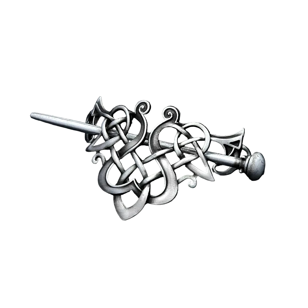 Silver hairpin with intricate design on a black leather background