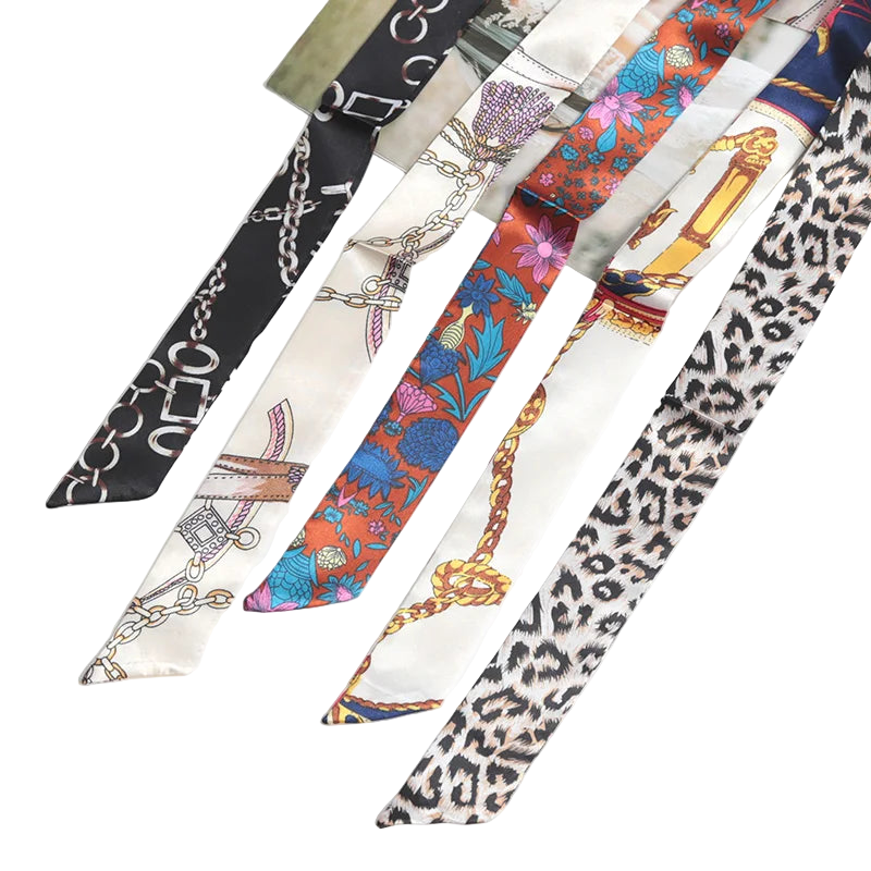 Collection of patterned scarves on a white background