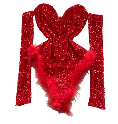 A red sequined bodysuit with long sleeves and feather trim. The design is glamorous and bold, perfect for a standout performance or event.
